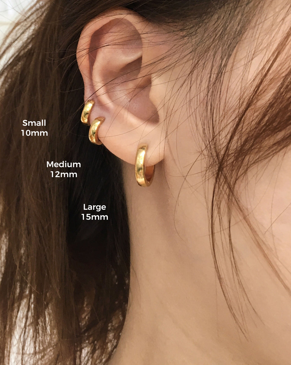 Multiple gold outlet hoop earrings
