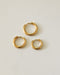 gold huggie hoop earrings in 3 sizes by the hexad