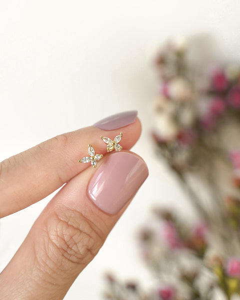tiny bliss butterfly stud earrings crafted with diamonds from the hexad
