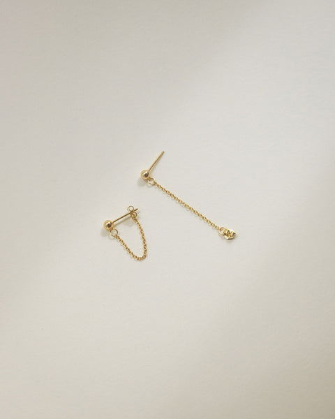 versatile stud earrings in gold designed to be worn in two chic ways @thehexad