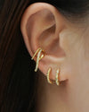 achieve contemporary multiple piercings look with the hexad ear cuffs and everyday hoop earrings