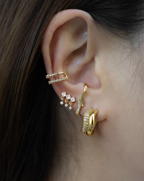 achieve your dream ear party with dramatic party ready pieces such as our drizzle drop earrings, echo ear cuff and crest illusion earrings all designed with glittery pave diamonds
