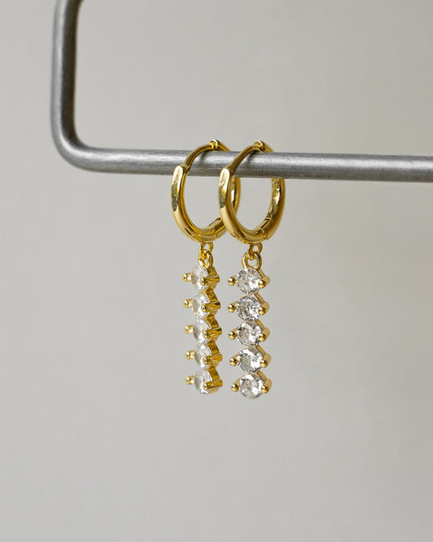 bold drop style earrings featuring sparkly circle cut diamante stones