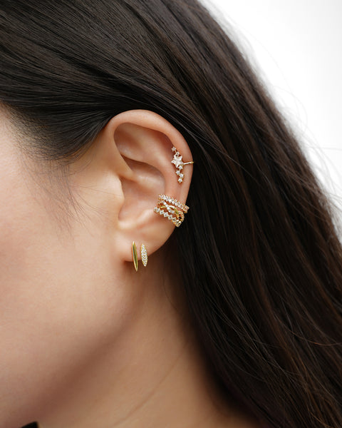 bold statement ear stack featuring newly launched revelry illusion earring and bestselling regal ear cuffs and constellation ear cuff from the hexad brand