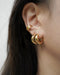 bold stylish ear stack featuring taylor tube hoops and cleopatra ear cuffs from the hexad