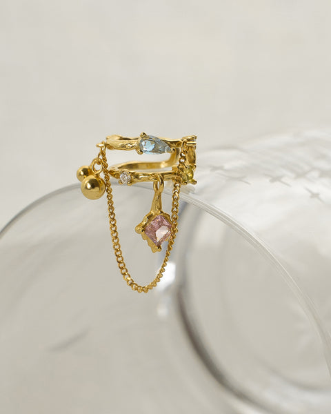 brand new gypsy ear cuff in gold features pastel blue and pink diamond gems for fun feminine charm