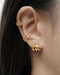 build your dream ear stack with the hexad's illlusion huggie hoops and no piercings needed ear cuffs