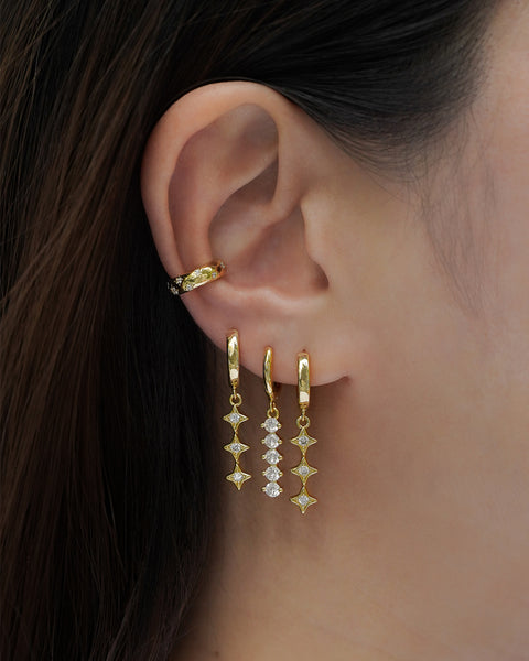 celestial inspired ear party from the hexad featuring stellar ear cuff, aurora dangle earrings and nova dangle earrings