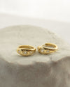 channel feminine energy with simple golden hoop earrings featuring sweet dahlia flower motifs