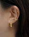 clicker style solaris teardrop hoop earrings are both perfect when worn on its own and when layered with cuffs for a stacked look