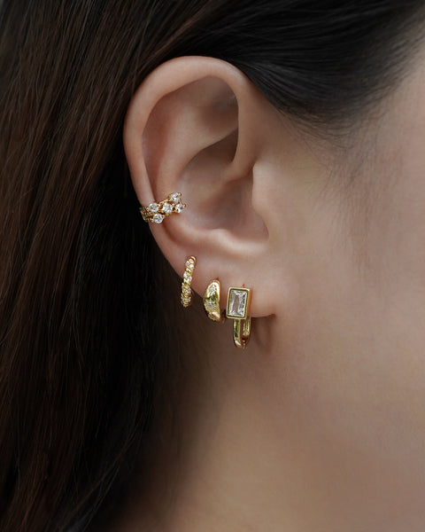 curate a diamond studded ear party with the latest jemma ear cuffs and bestselling huggie hoop earrings from thehexad.com