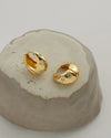 delightful sunburst motifs are the highlight of the hexad solaris teardop hoops