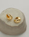 delightful sunburst motifs are the highlight of the hexad solaris teardop hoops