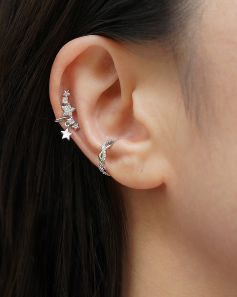 dress your ears in stars and diamonds with the hexad label's auriga ear cuff and regal ear cuff in silver
