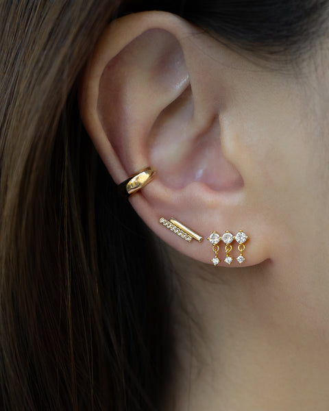 effortlessly create the illusion of multiple piercings with the hexad's unique drizzle drop earrings, signature ear cuffs and easy to layer stud earrings
