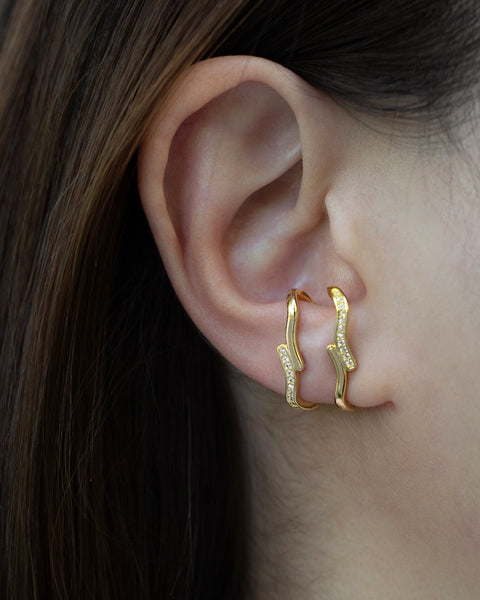 elevate your ear game with fresh unique designs like the classy echo suspender earrings adorned with micro pave zirconia