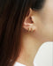 exude classy elegance with rope inspired gold huggie hoop earrings