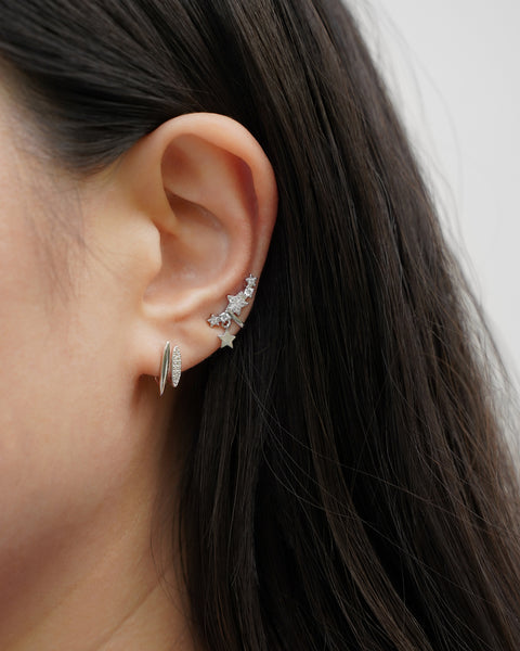 exude cute and feminine vibes with the petite revelry ear cuff and auriga ear cuff designed with a small dangly star charm