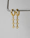 nova dangly earrings feature trio of starry diamond stones for a dreamy romantic vibe