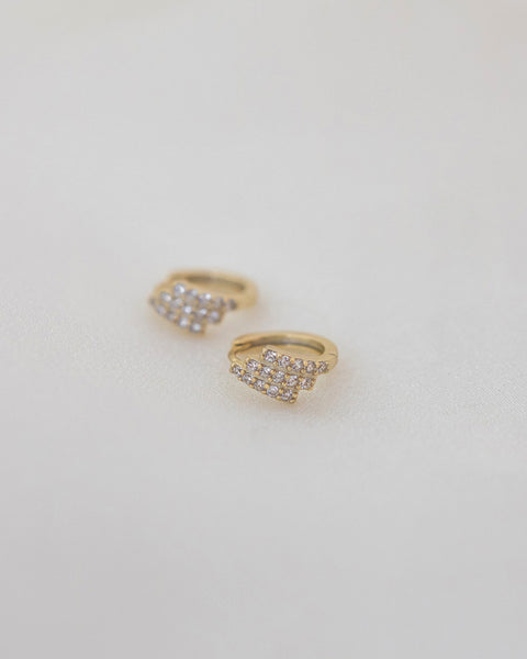 sophisticated hoop earring design with faux diamonds