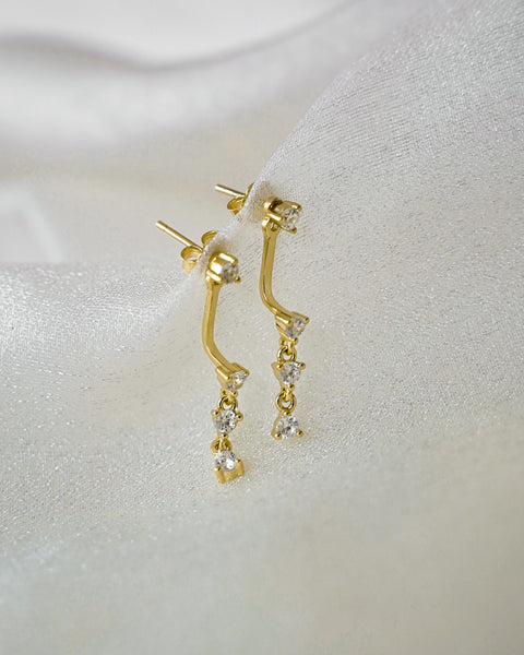 stunning ear jacket style earrings with gorgeous dangling triple diamonds for a party ready look