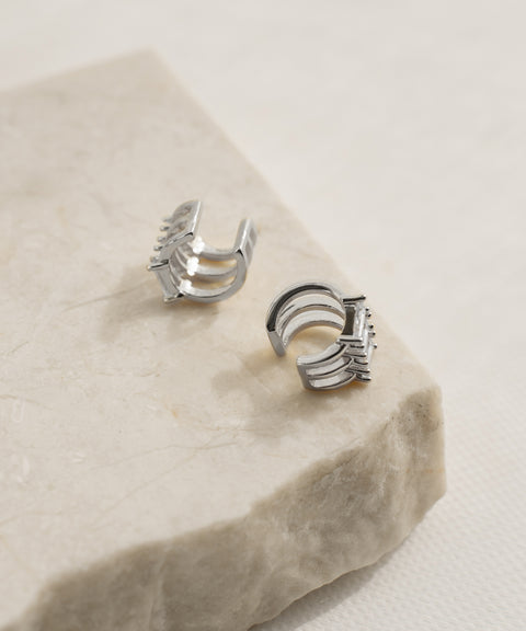 the hexad's silver trapezoid diamond ear cuffs gives you the multiple piercings look even when you have zero ear piercings.jpg