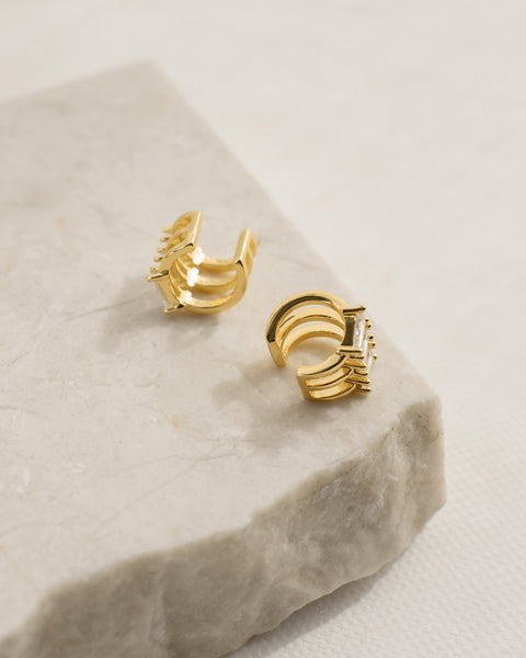the hexad's trapezoid diamond ear cuffs gives you the multiple piercings look even when you have zero ear piercings