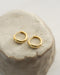 the hexad signature hoop earrings now feature petite dahlia flower designs with tiny diamand stones for a touch of sparkle