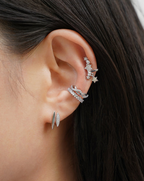 the ultimate modern ear stack is effortless and painless with the hexad's ear cuffs and illusion earrings