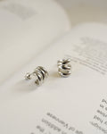 tiny three hoops in one earring design from the hexad to level up your ear stack instantly