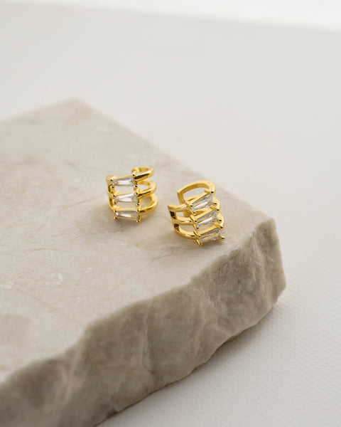 triple banded ear cuffs set with trapezoid shaped diamonds for a beautifully chic look