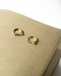 18k gold plated Pixie huggie hoop earrings by modern women jewellery label the hexad
