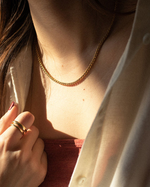  A versatile gold chain is a must-have accessory staple - Woven chain necklace by The Hexad