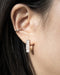 Add a touch of sparkle with the shiny Dazed earrings by The Hexad