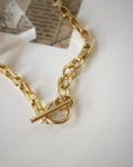 Bold Parallel Choker in gold by The Hexad