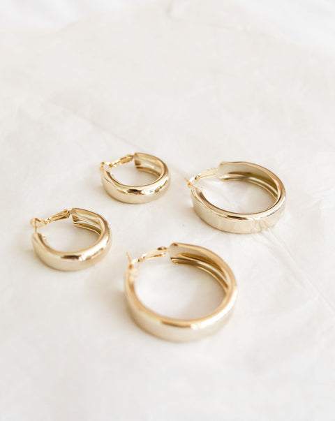 Chunky gold hoops in a subtle champagne gold hue - The Hexad Earrings