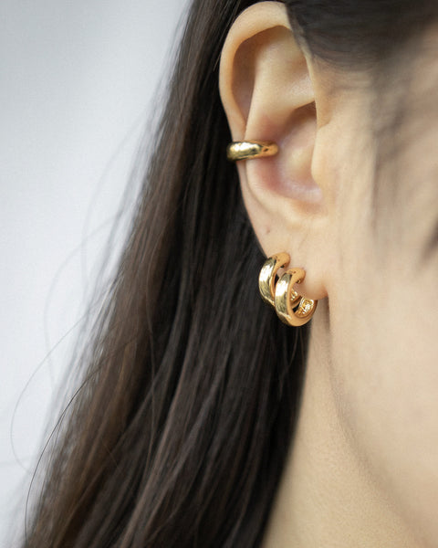 Classic golden hoop stack curated by The Hexad