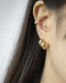 Classic golden hoop stack curated by The Hexad