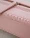 Close-up details of the hexagon shape prism crossbody bag featuring smooth, dusty shell pink genuine leather- The Hexad Bags