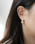 Cubic zirconia white stone earrings by The Hexad