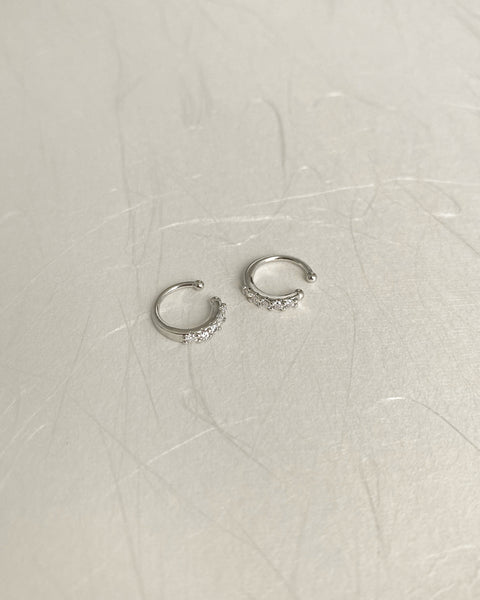 Dainty silver Moonshine ear cuffs with tiny diamantes for a little bling ear party