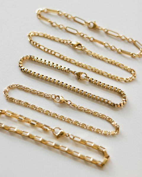 Delicate chain bracelets that are perfect for stacking - The Hexad