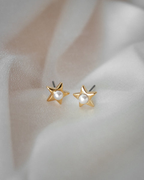 Dreamy earrings featuring a petite pearl set in a star - Belle by The Hexad