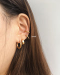 Ear party stack with the Retractable hoops worn as a lobe and conch piercing - The Hexad