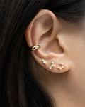 Ear pary with micro gold stud earrings in unique shapes and designs | thehexad