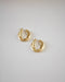 Flat golden hoops featuring a unique uneven surface @thehexad