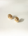 Stylish golden ear studs for chic everyday wear 