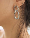 Interlinking odd-sized oval hoop earrings in Silver - The Hexad Jewelry