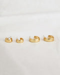 JuJu earrings features a thick flat band and an open hoop design - The Hexad Earrings