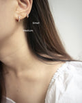 Kira Huggie Hoops in Gold - The Hexad Earrings